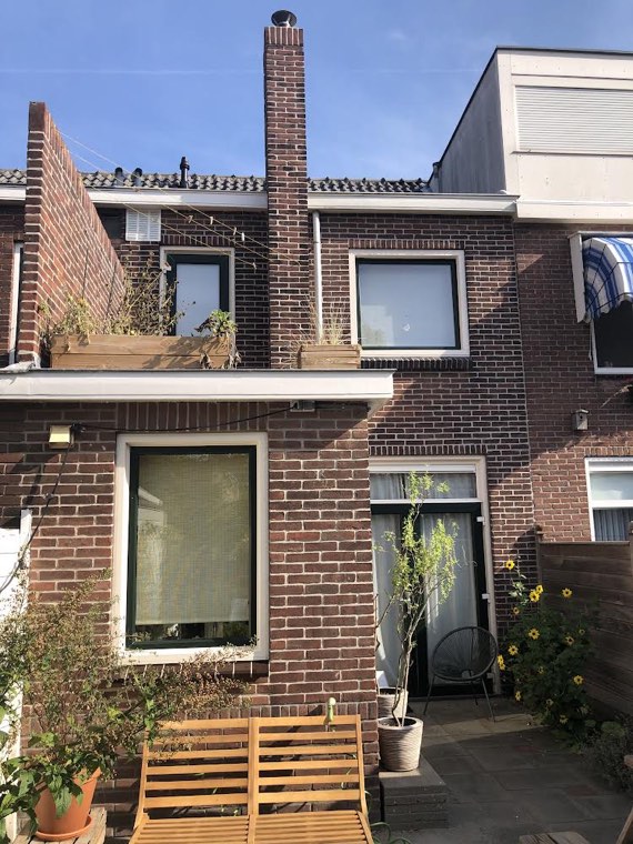Achtergevel met balkon