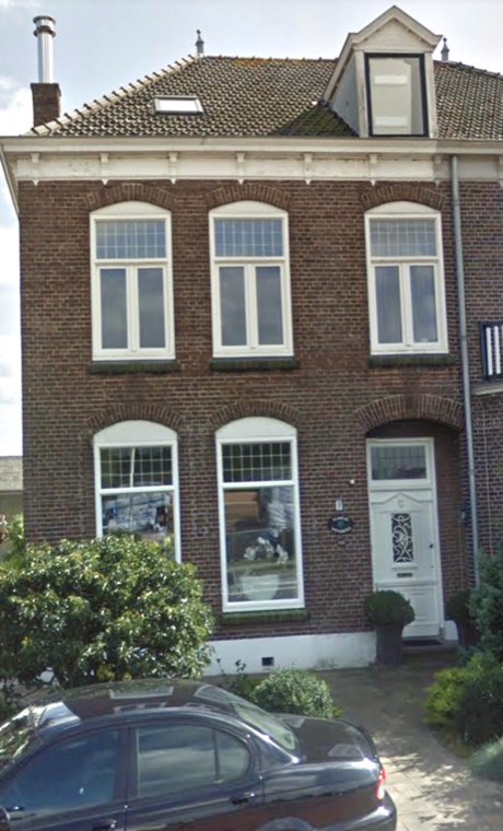 Woonhuis met boogramen